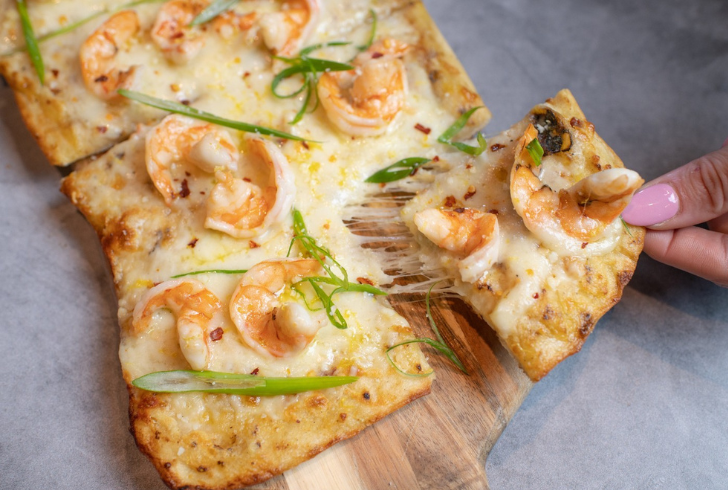 Shrimp Scampi Flatbread, a sophisticated seafood appetizer